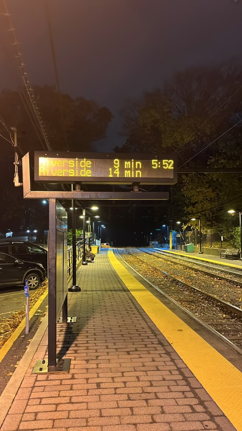 Green Line D branch tracker showing Riverside trains 9 and 14 minutes away